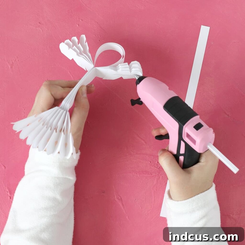 How to glue down paper angel wings for a polished Christmas craft look