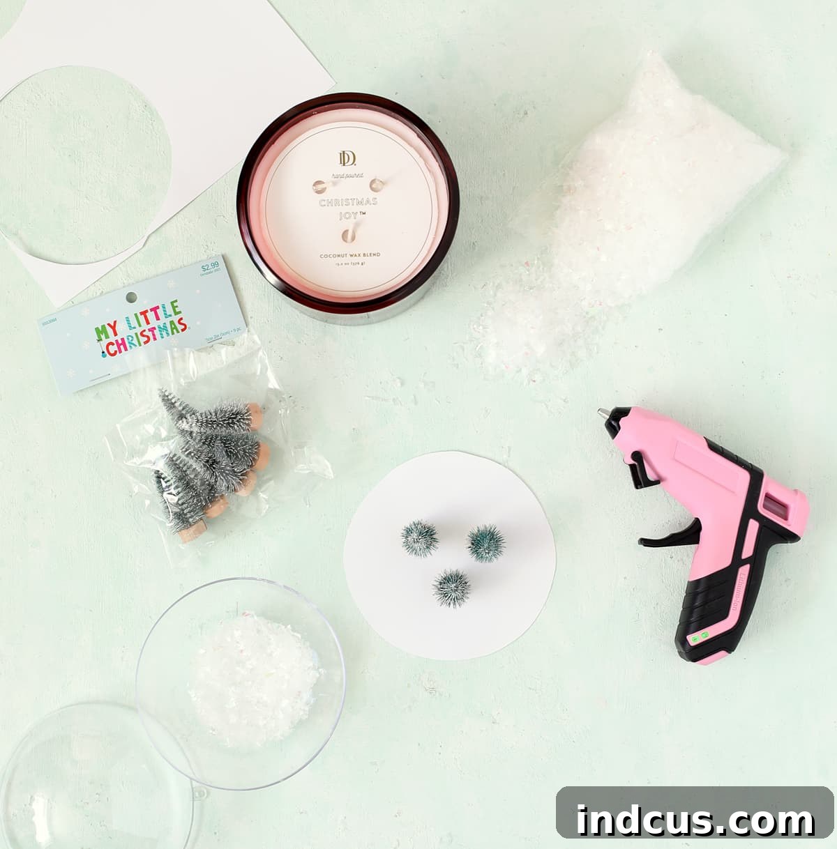 how to make a snowglobe candle without a lid demonstrating sealing the ornament base