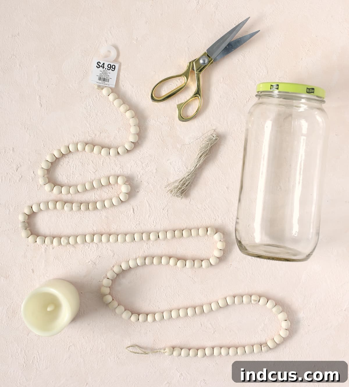 A curated selection of materials needed to create a beautiful wood bead lantern