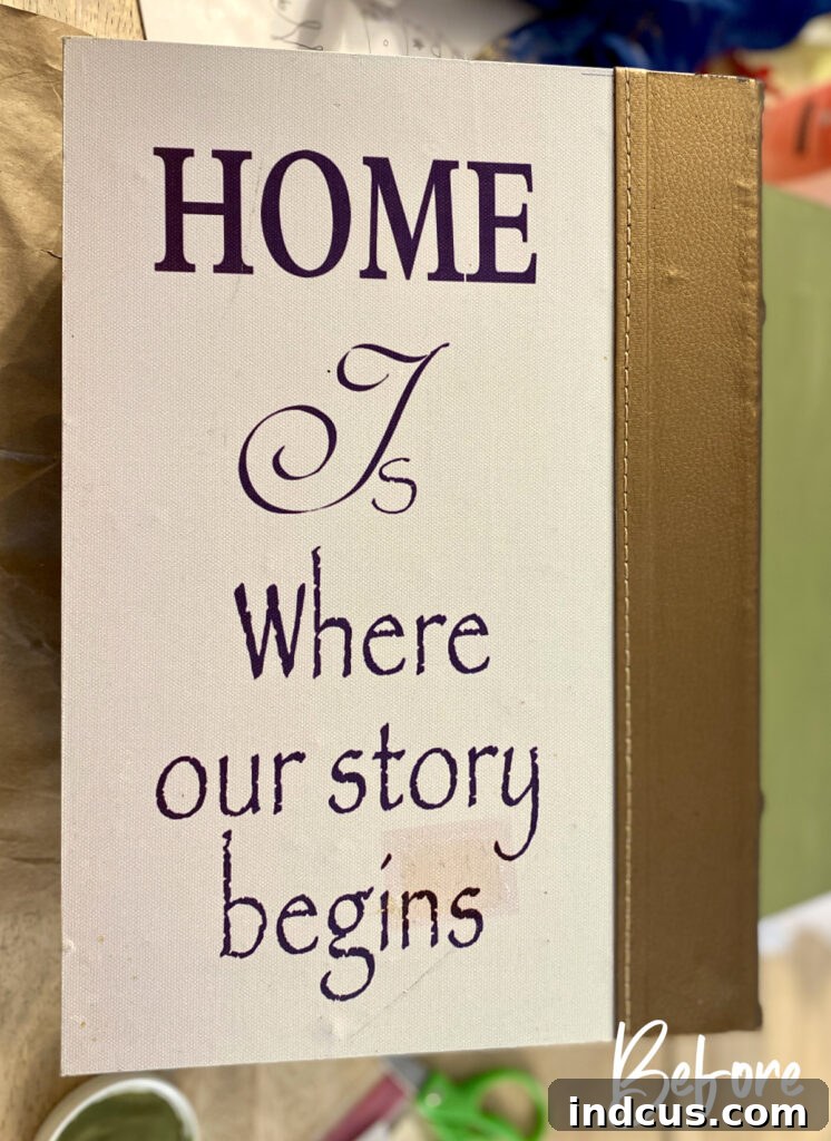 Secret Book Box Charging Hub 3 Before photo of a thrift store book box with a dated design and cheesy saying