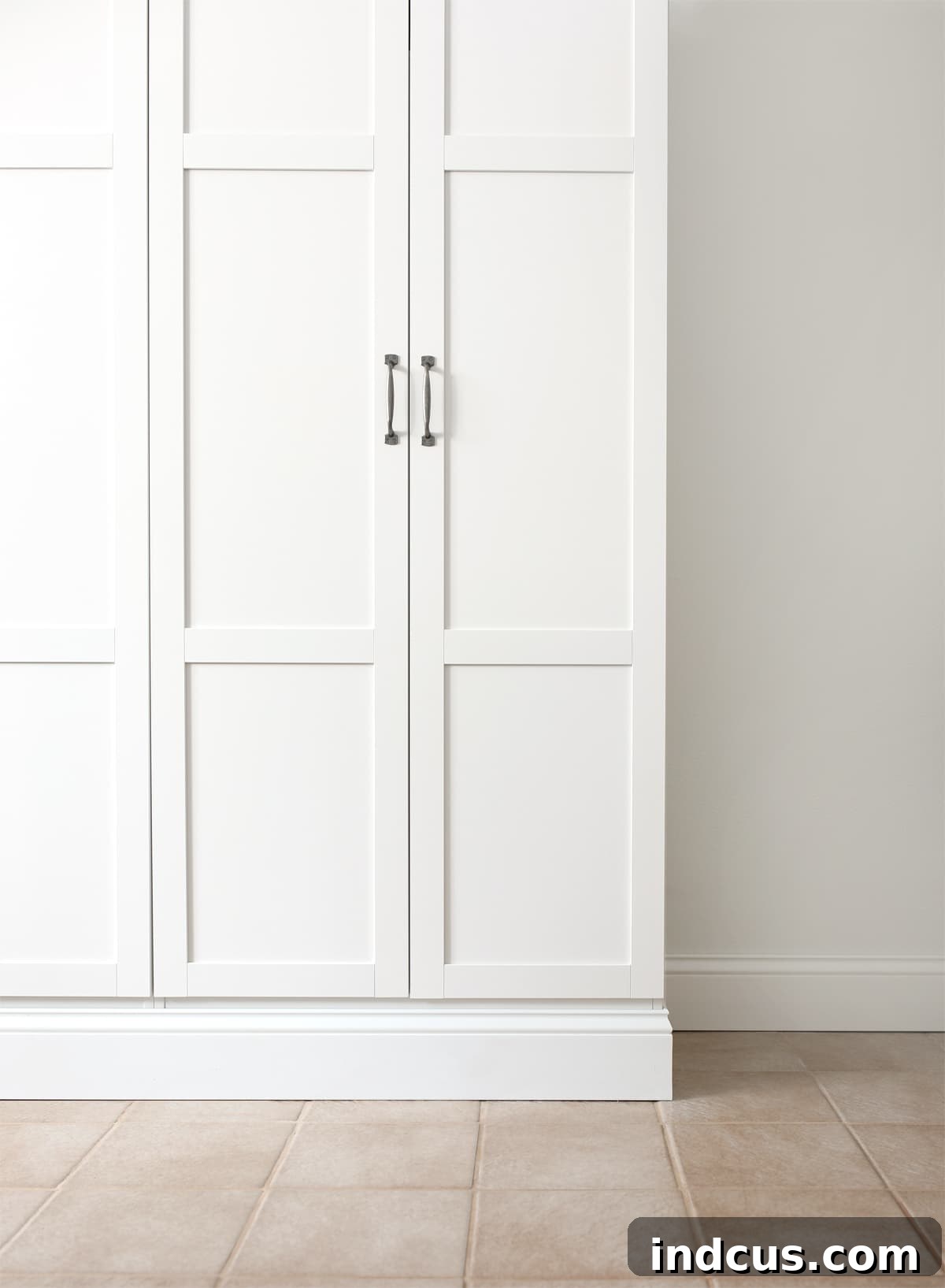 Detailed interior of DIY built-in cabinetry made from flat-pack furniture, showing adjustable shelves