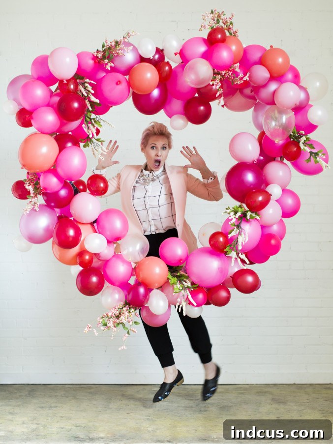 DIY heart-shaped balloon backdrop for a Valentine's or Galentine's party