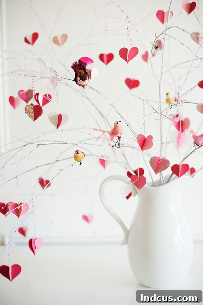 DIY Valentine's Day branch tree decorated with paper hearts