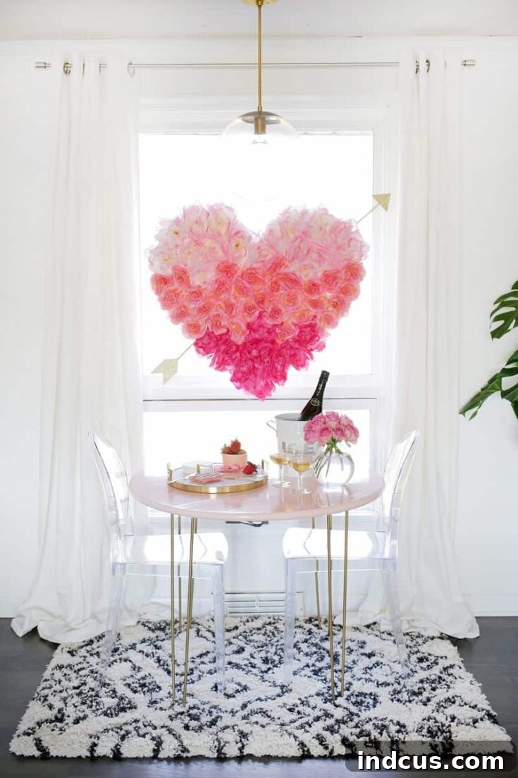 DIY hanging flower heart backdrop with ombre arrangement