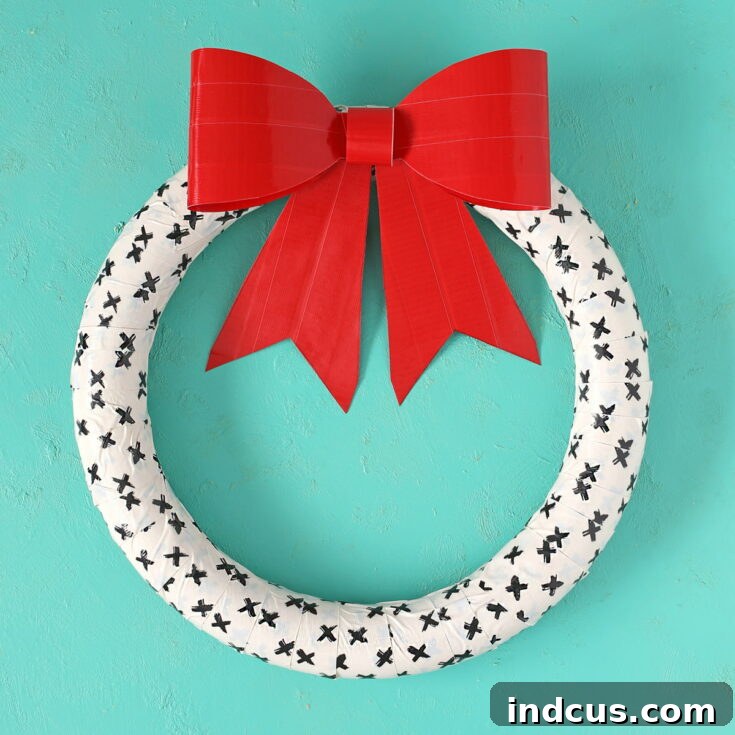 Creative Duck Tape Valentine's Day wreath with a giant red bow