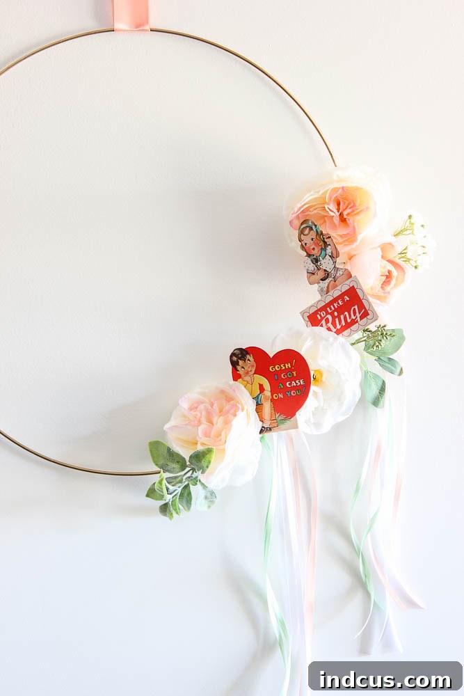 Quick and simple Valentine's wreath DIY with vintage Valentines on a gold hoop