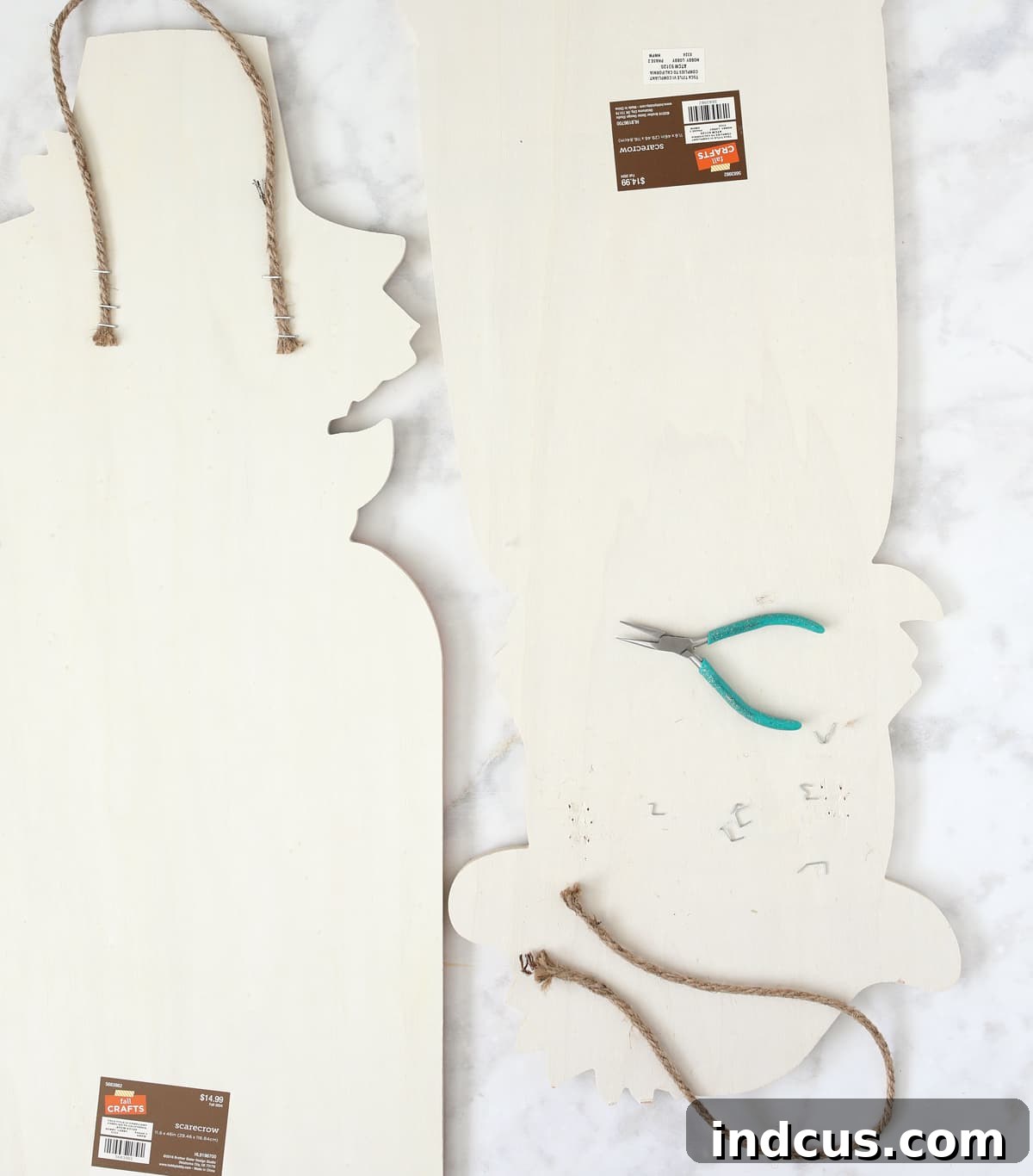 remove staples and hanger from back of wood sign