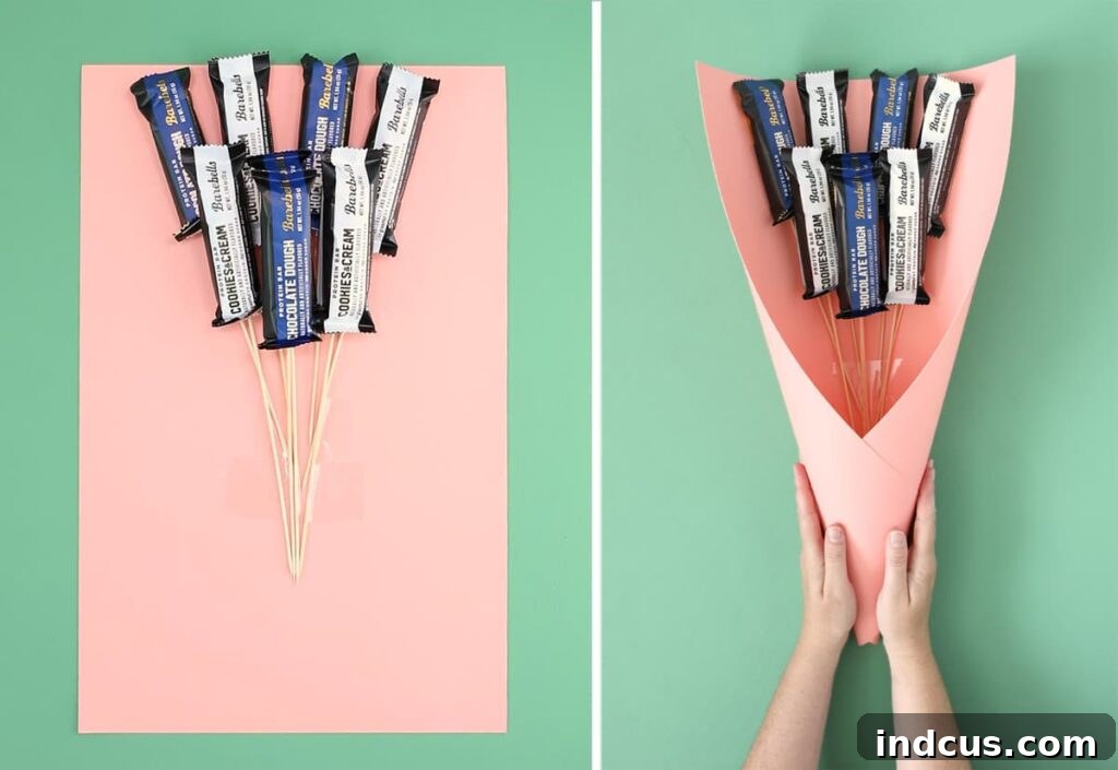 Step-by-step guide on how to form the cone base for a homemade gift bouquet, like a candy bar bouquet