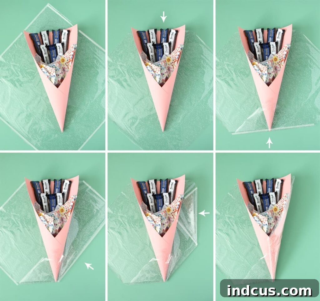 Detailed process of wrapping a cone bouquet with cellophane for a flawless and professional finish
