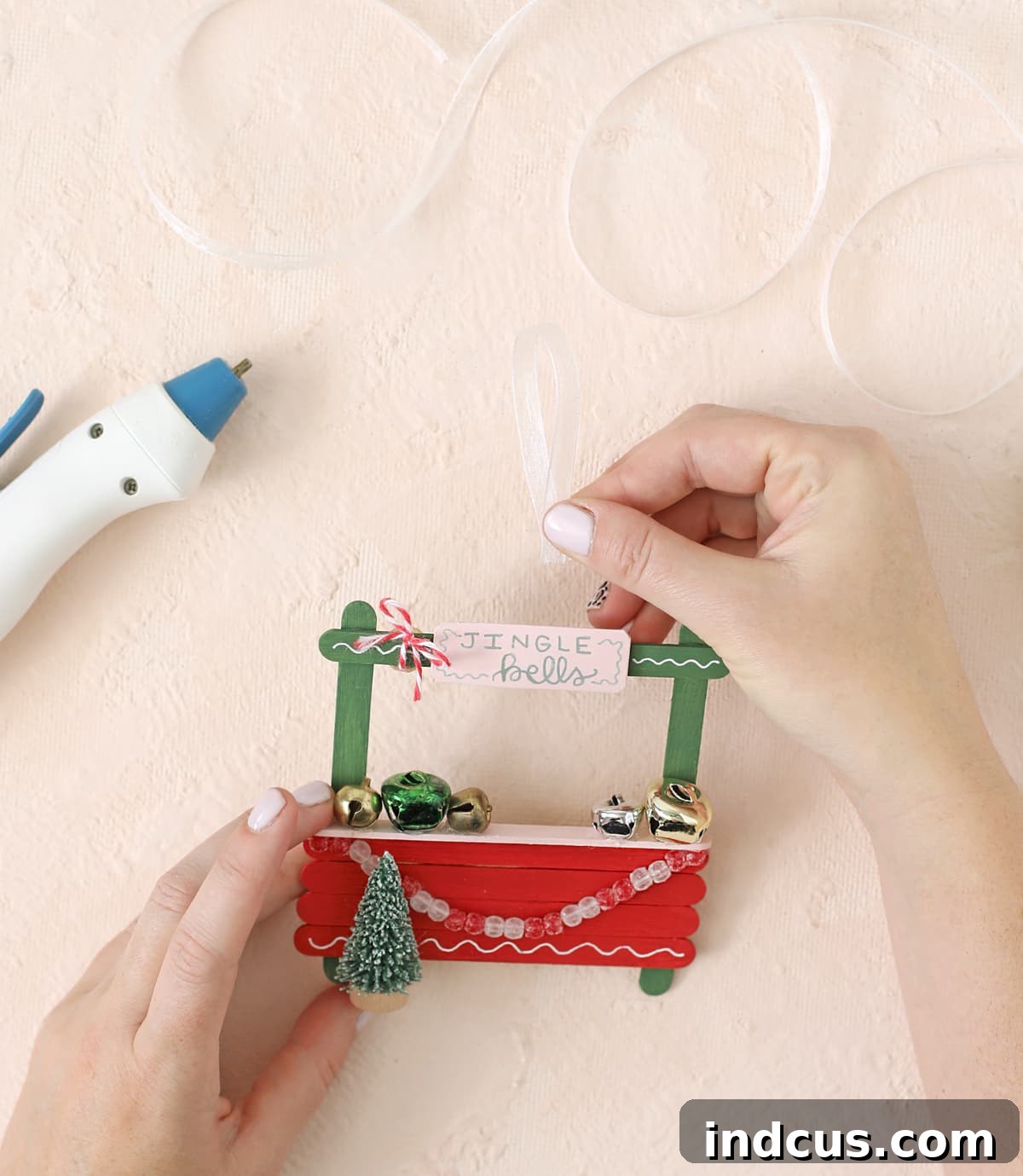 Attaching a ribbon loop for hanging handmade Christmas ornaments