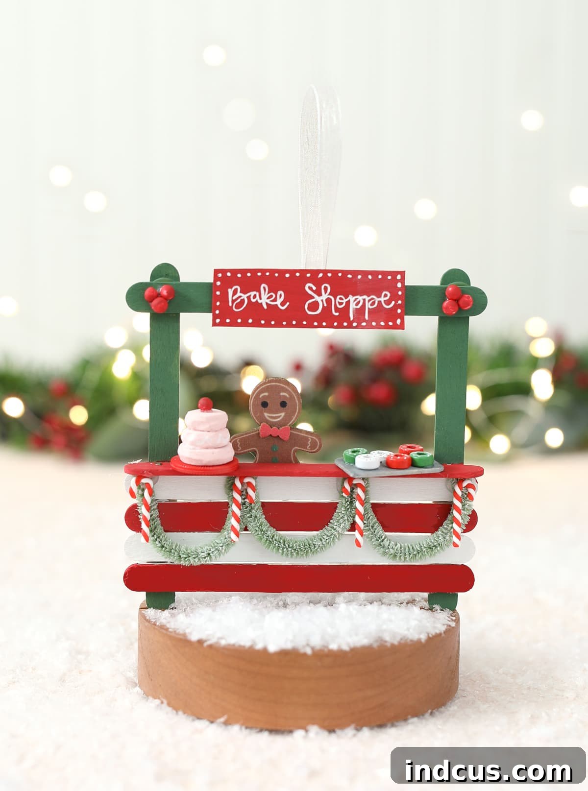 A festive bake shoppe popsicle stick Christmas ornament