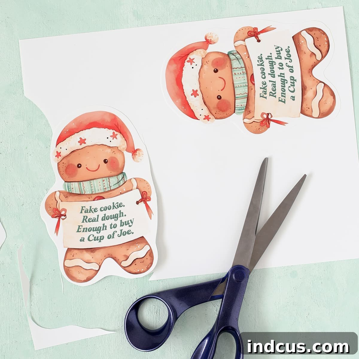 Cut around the outside of the layered Christmas printable gift