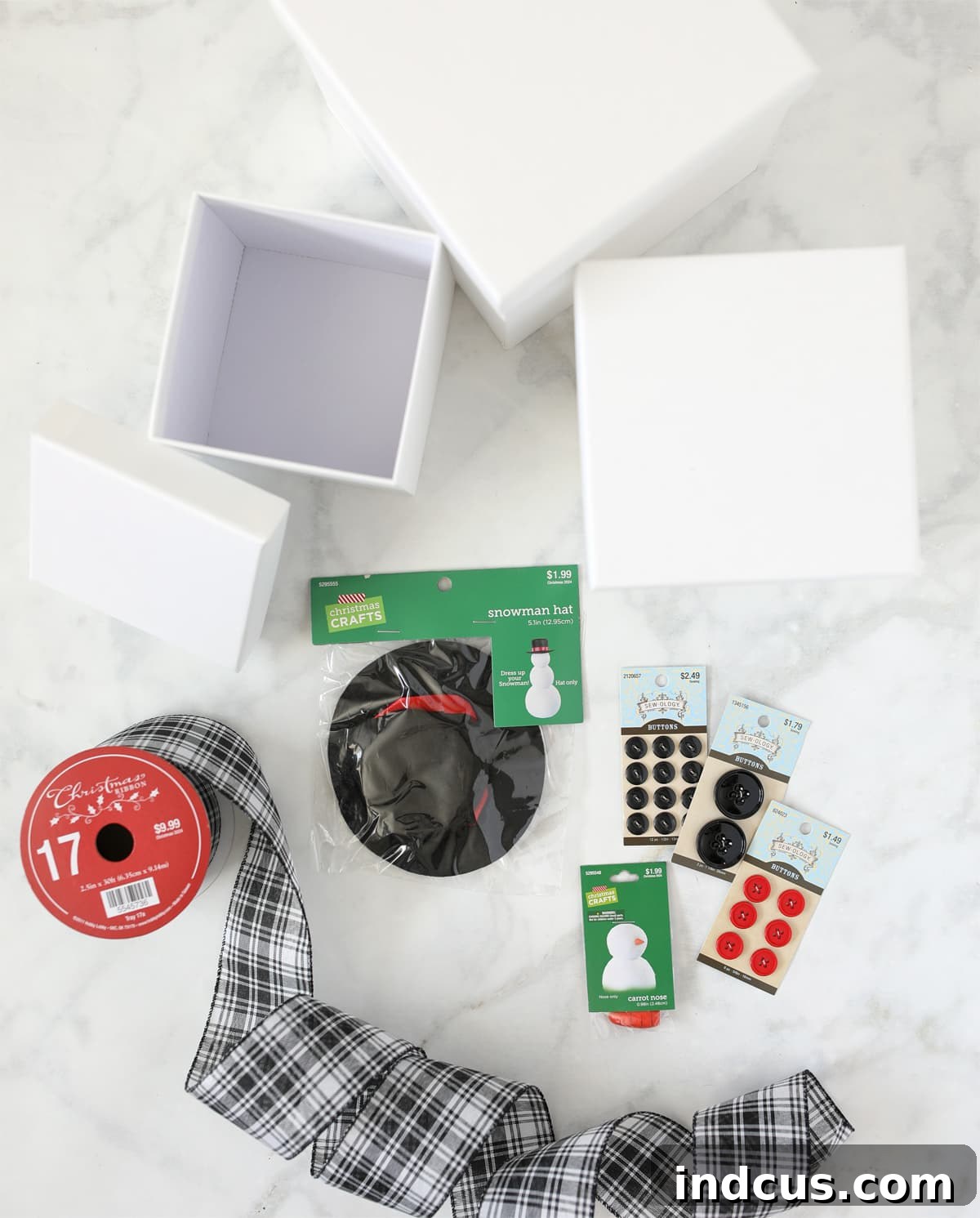 Supplies for creating a reusable snowman gift box tower