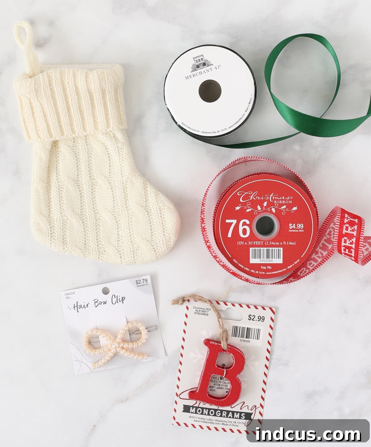 Charming mini Christmas stocking used as a creative gift card holder, adorned with festive embellishments.