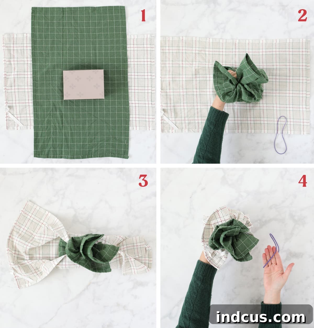 Eco-friendly gift wrapping method: Illustrating how to wrap a present using two festive Christmas tea towels.