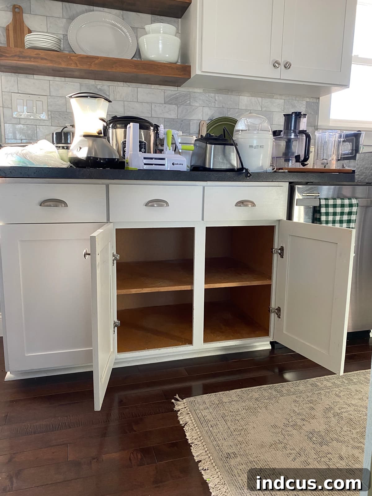 Kitchen cupboard being converted to pull out drawers