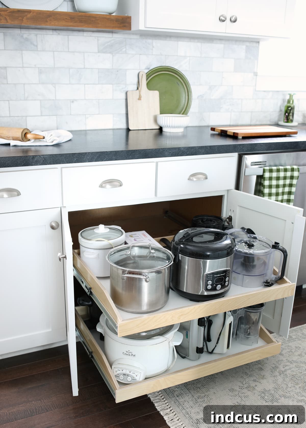 DIY pull out drawers installed in a kitchen cupboard, neatly organized