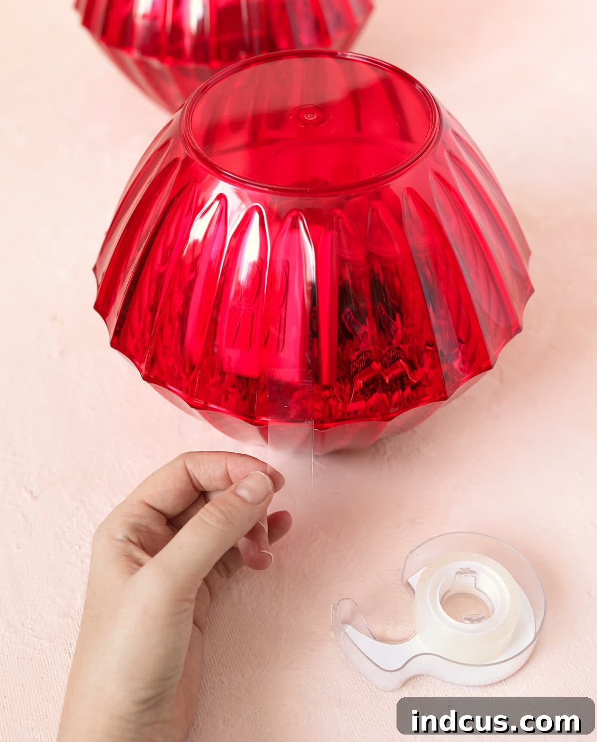 Mega Cherry Love Gift 5 Taping two red plastic bowls together to form a giant cherry