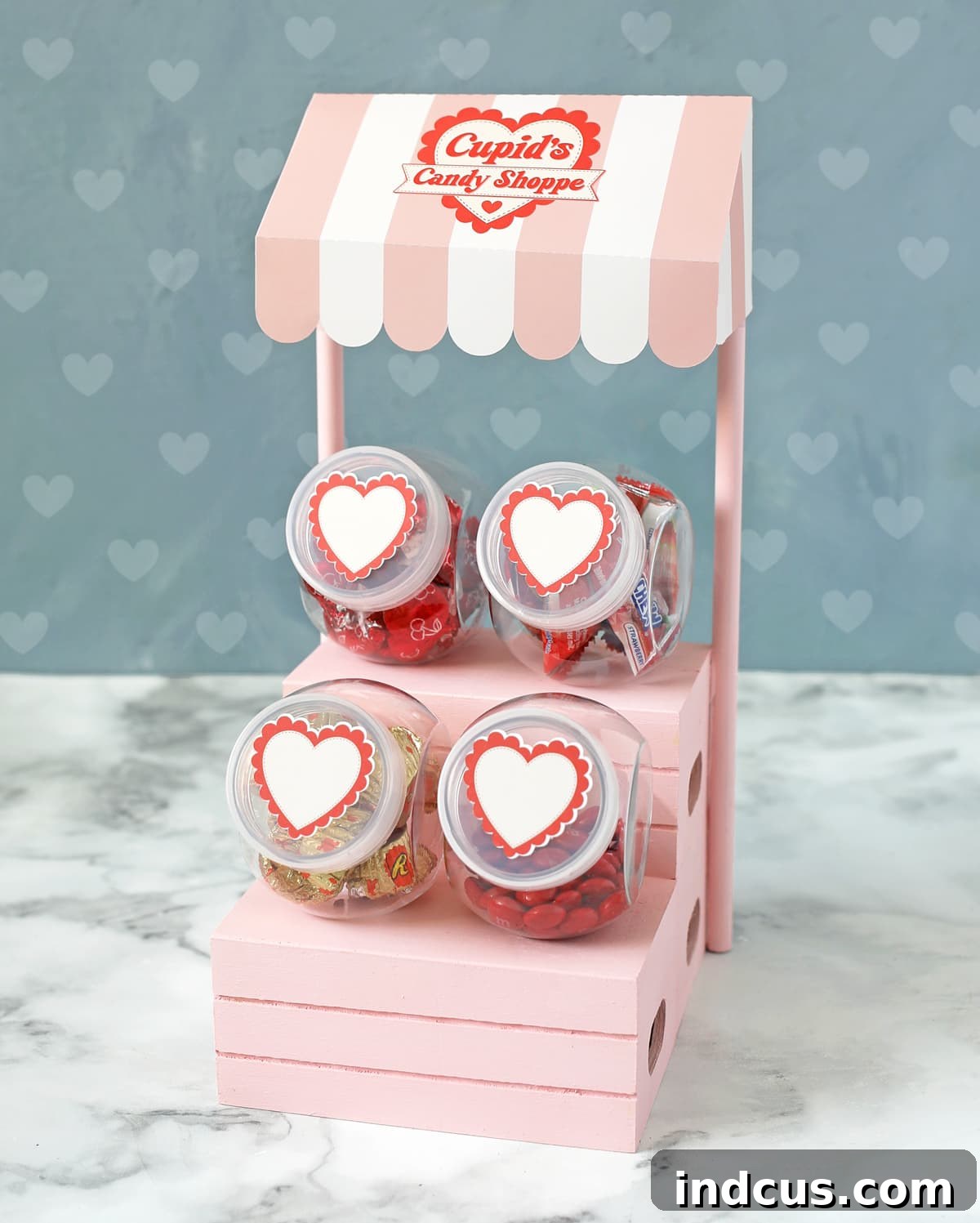 Cupid's Candy Shoppe: A delightful DIY Valentine's Day candy display crafted from Dollar Tree items.