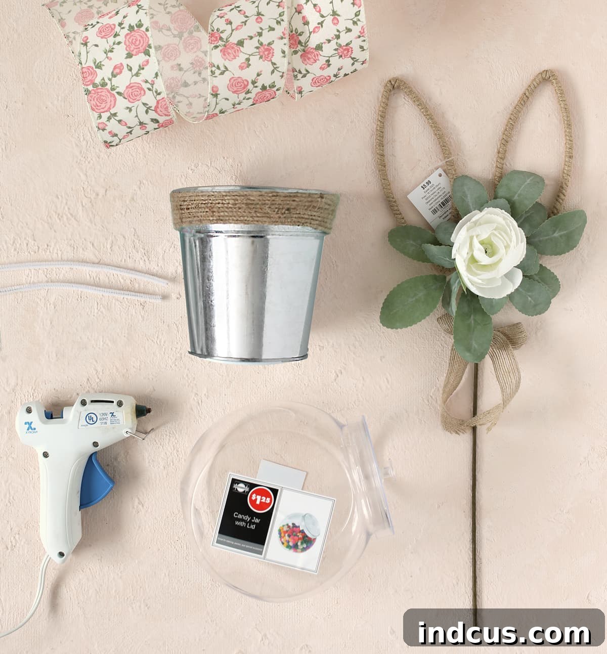 Essential materials for creating your DIY Easter bunny candy jar, including a jar, bucket, ears, paint, and embellishments.