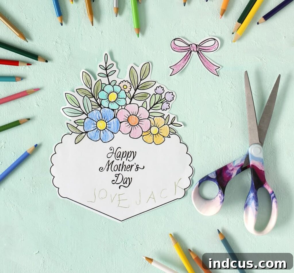 Printed and partially cut Mother's Day card, showing the bouquet shape and separate bow piece ready for assembly.