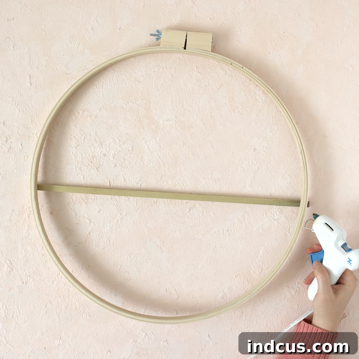glue dowel to embroidery hoop for craft project