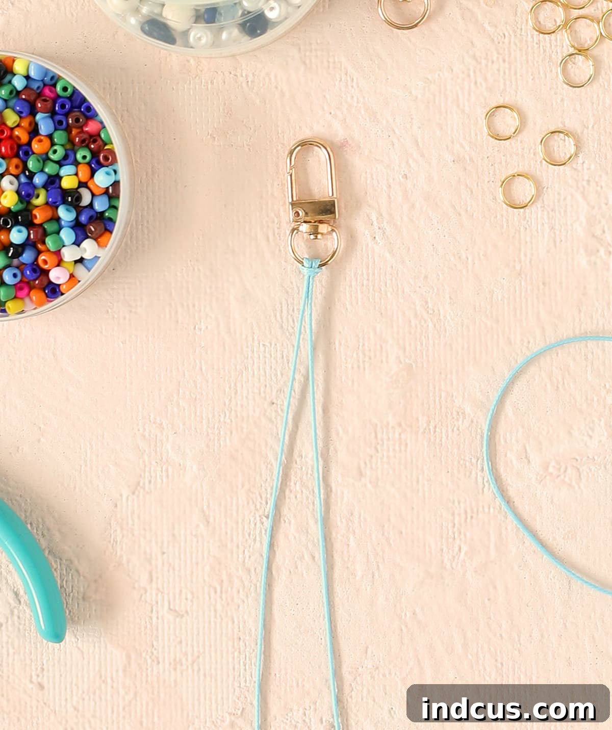 attach cord to lobster clasp