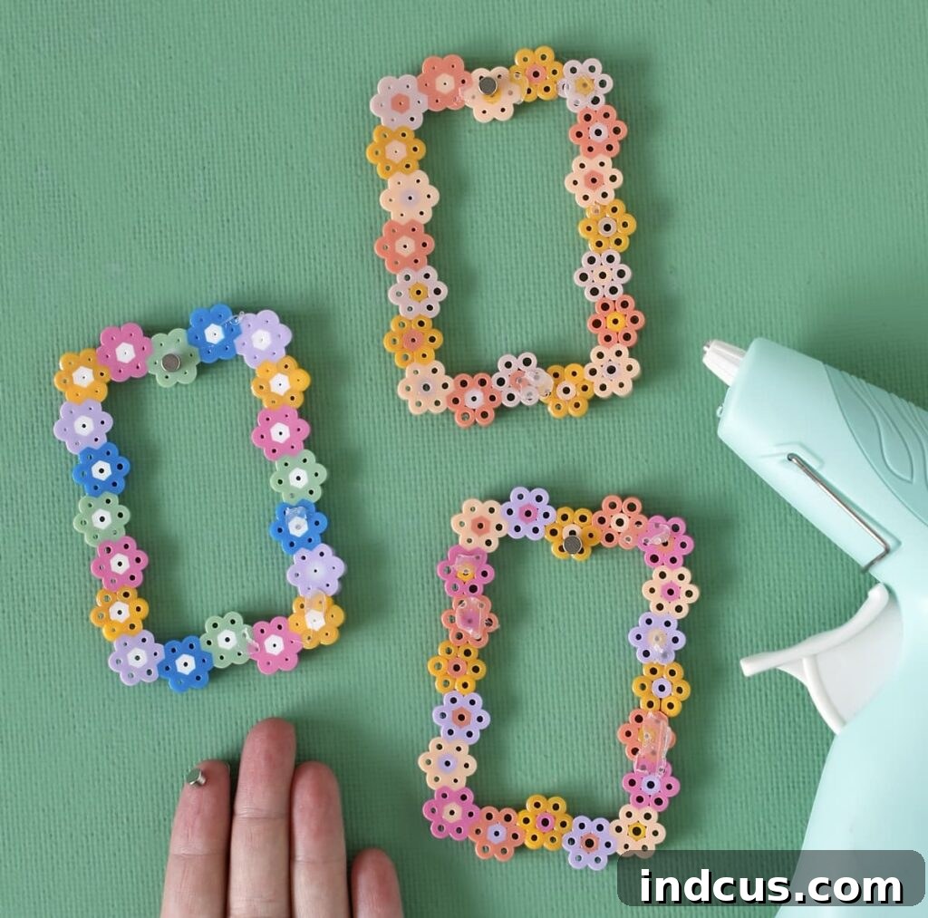 add mini magnets to the back of the beaded frames