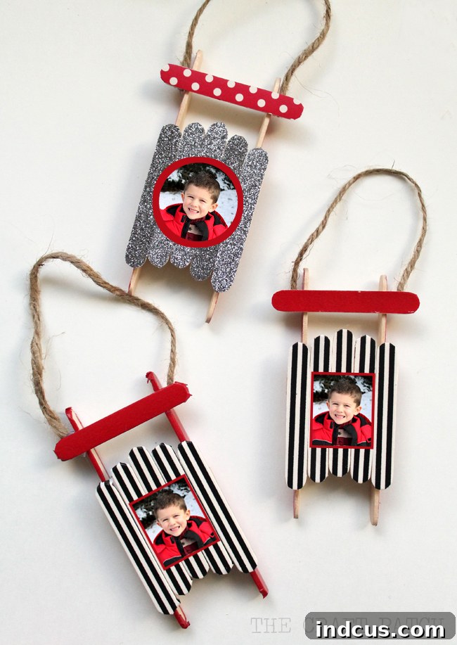 Creative Christmas Ornament Crafts 7 Popsicle stick sled ornaments with photo keepsake