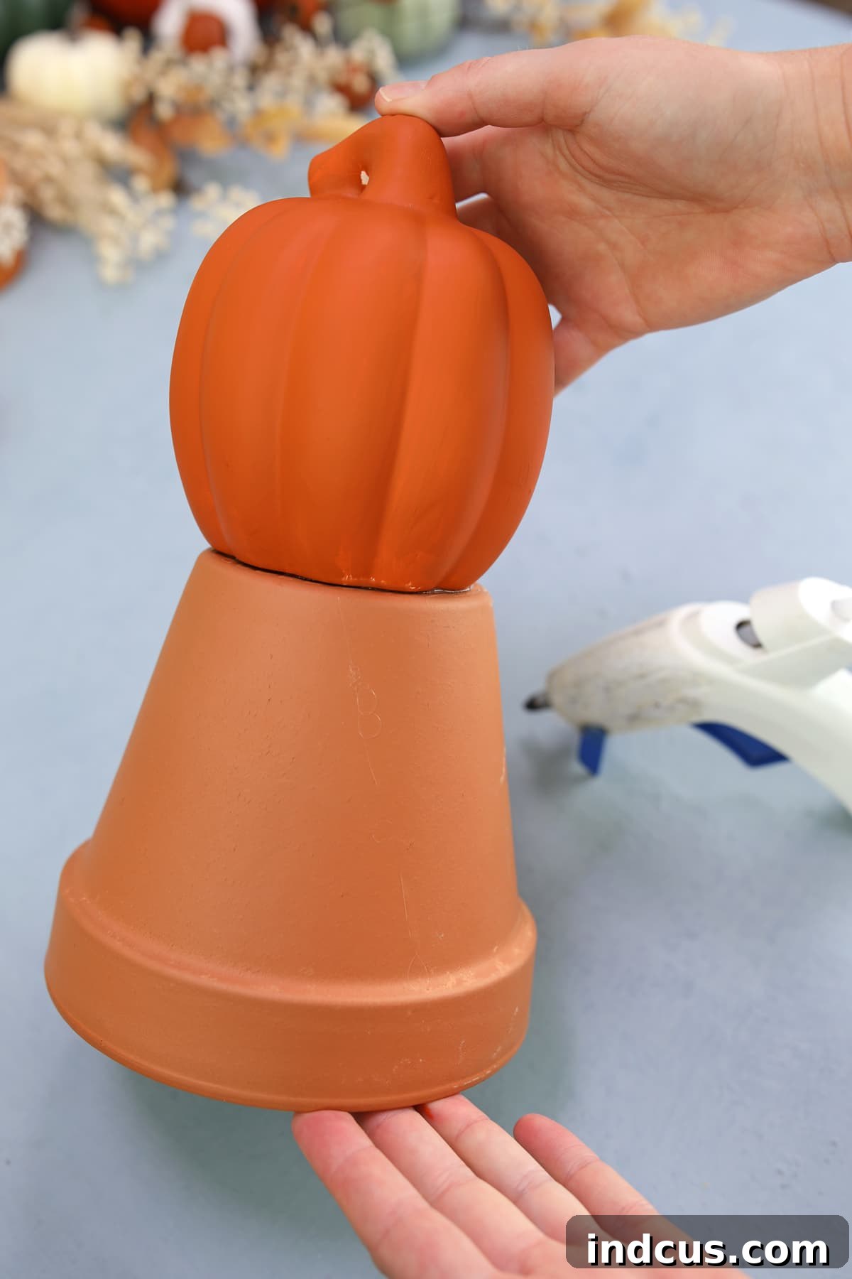 Craft Your Own Clay Pot Scarecrow 4 Clay pot scarecrow body and head assembly