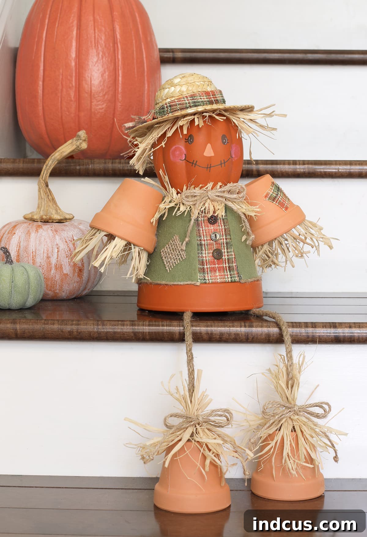 Craft Your Own Clay Pot Scarecrow 10 Finished terracotta pot scarecrow porch sitter craft in autumn setting
