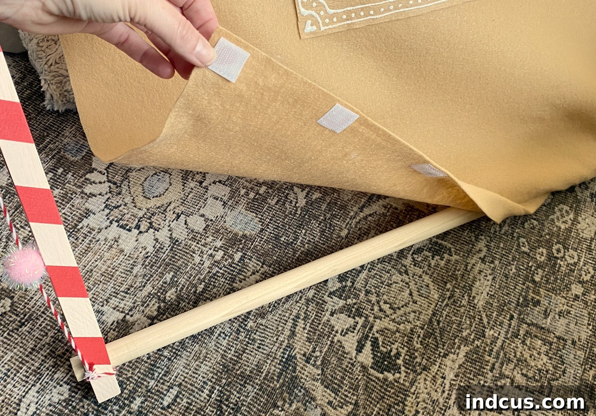 velcro on inside bottom edge of play tent for secure attachment