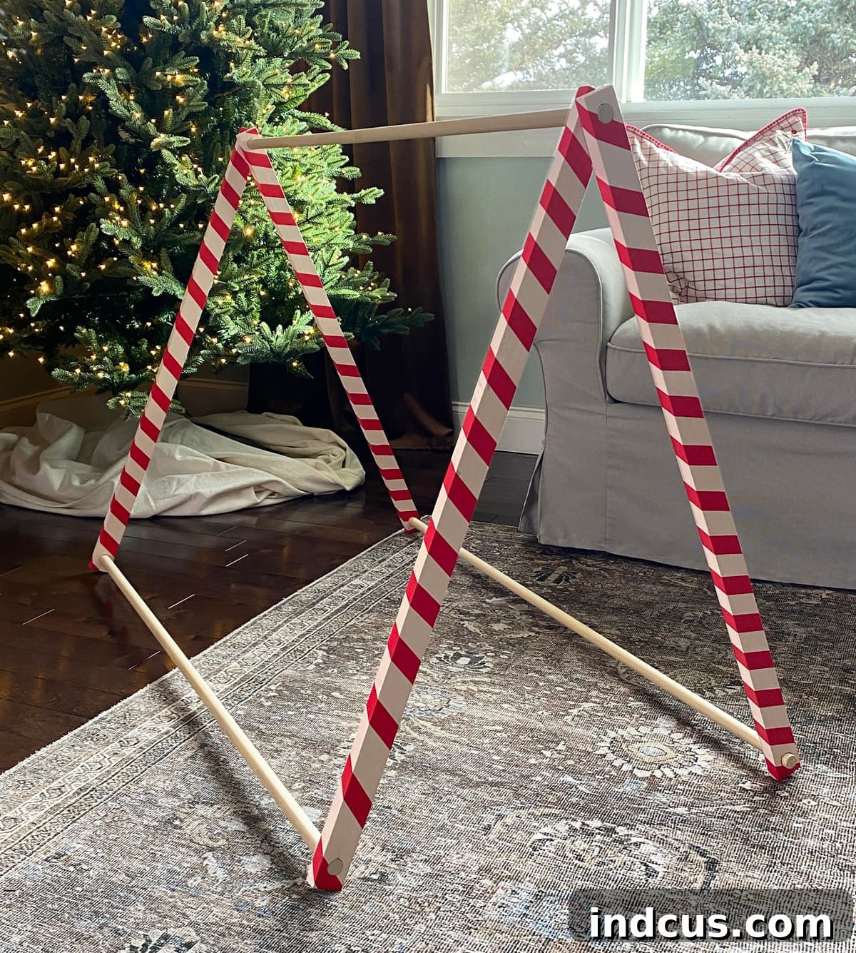 how to build a play tent frame, showing the completed A-frame structure