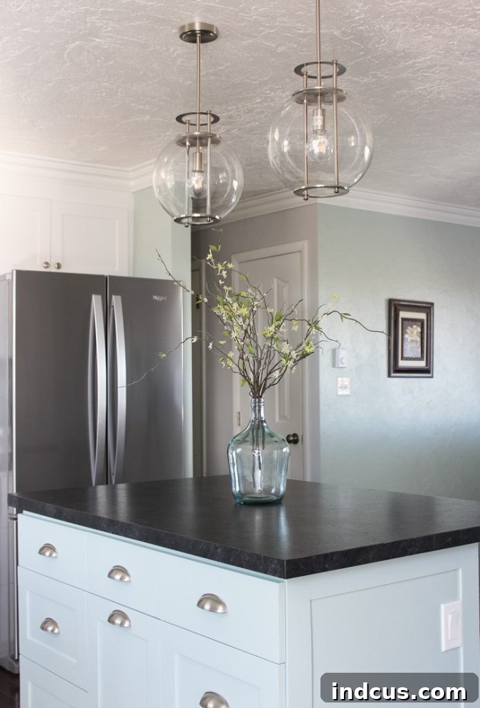 Elegant blue glass jug, perfect for kitchen island decor