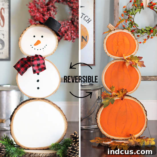 Reversible wood slice craft featuring pumpkins and snowmen for seasonal decor