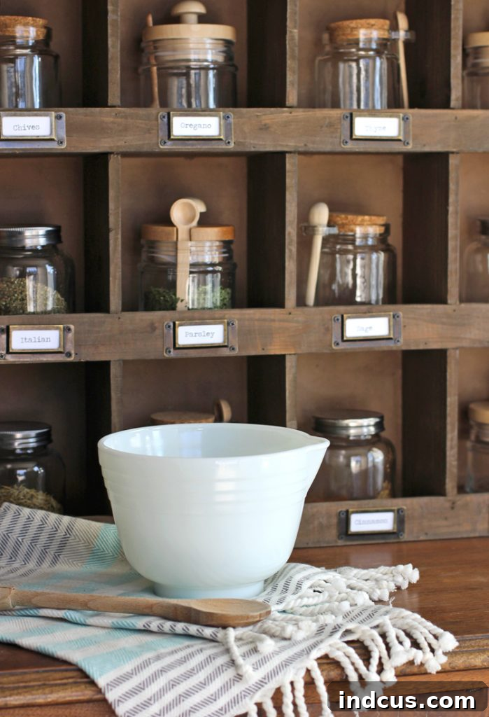Cute spice jars organized neatly on a rack, enhancing kitchen decor
