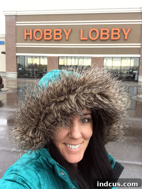 A person enjoying shopping at Hobby Lobby, pushing a cart