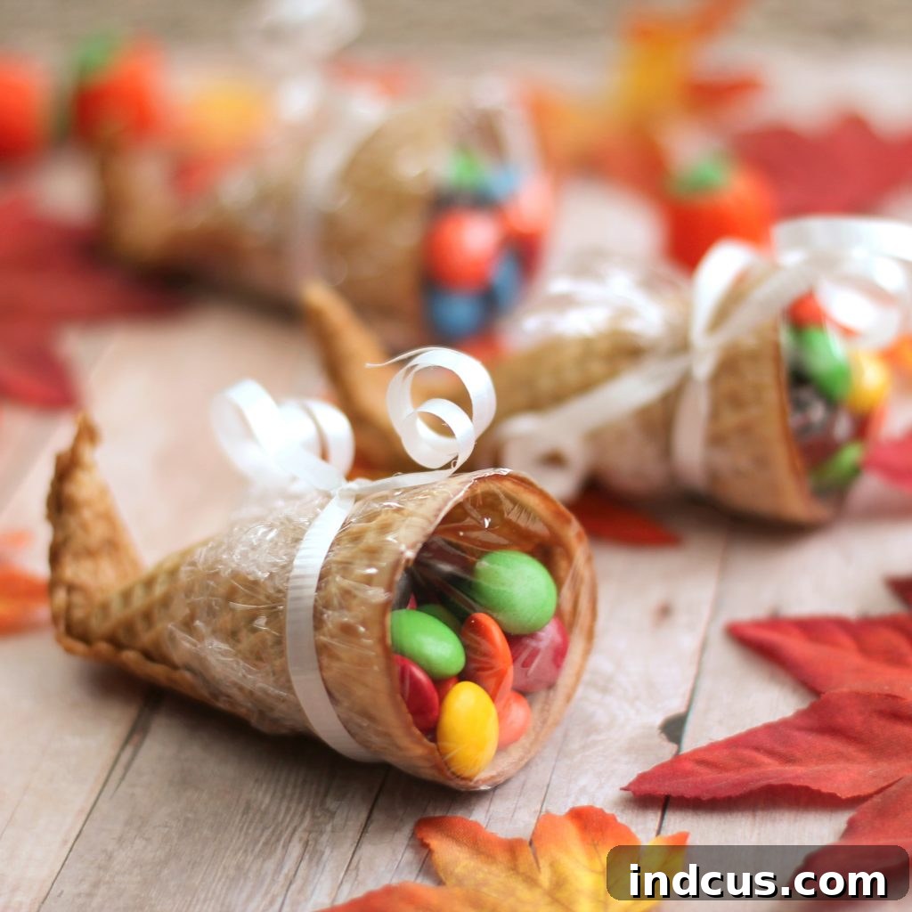 Miniature sugar cone cornucopia treats filled with candy for Thanksgiving