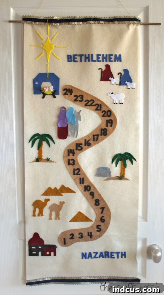 Beautiful handmade felt Nativity advent calendar showing Mary and Joseph on their journey to Bethlehem