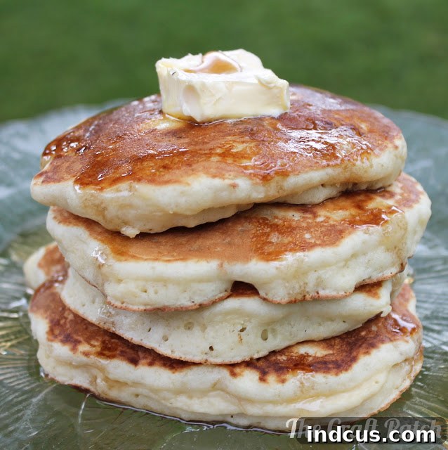 Thick and fluffy banana pancakes stacked high