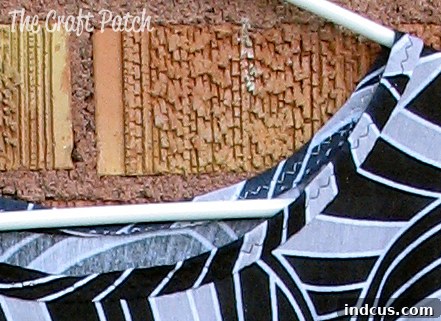 Close-up of finished neckline on nursing cover