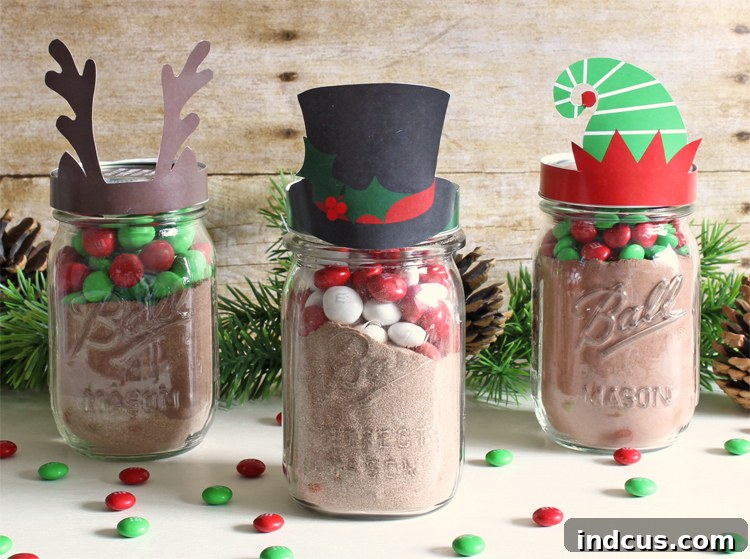 Festive hot cocoa mix in mason jars with holiday hat toppers