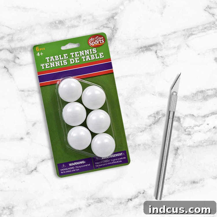 Easy dollar store Christmas tree hack using ping pong balls