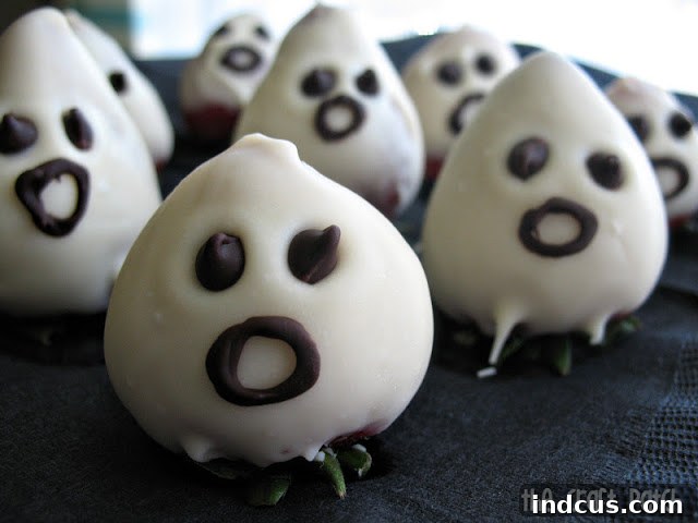 Ghoulish Gourmet Gathering 7 white chocolate covered strawberry ghosts for halloween