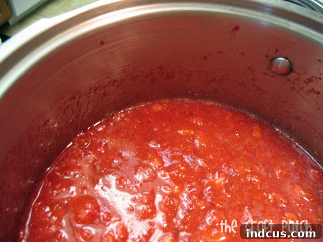 How to make jam at home - pot of simmering strawberry mixture