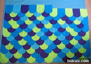 Example of a random design layout of felt pieces for a quilt