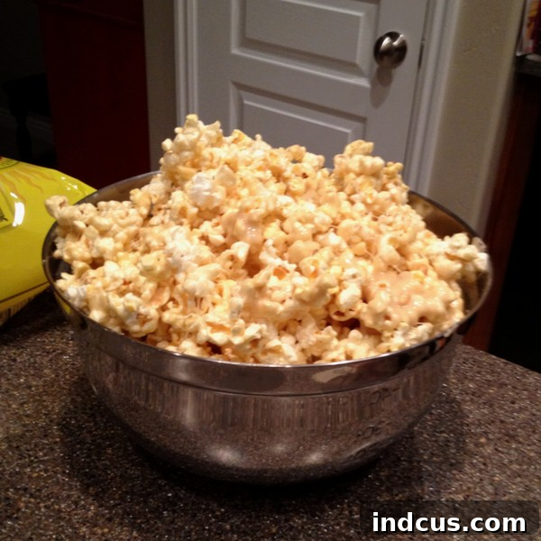 Pinterest Perfect Popcorn 3 Close-up of a vibrant bowl of deliciously gooey marshmallow popcorn, ready to be enjoyed