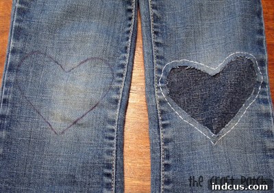 patching jeans with heart design using a template