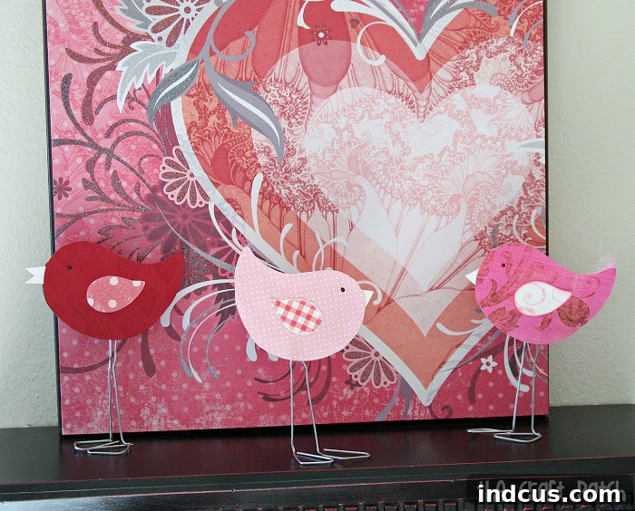 Finished Valentine's Day paper clip love bird craft displayed