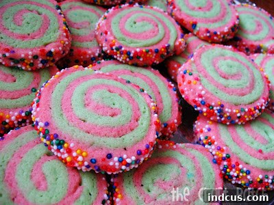 Christmas Swirl Cookies with red and green swirls and festive sprinkles